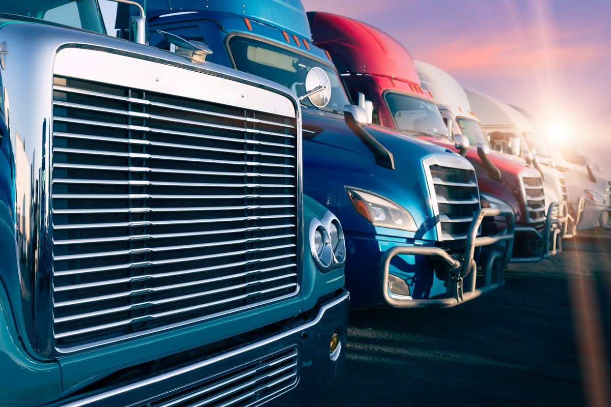 Long haul container trucks carrying commercial cargo